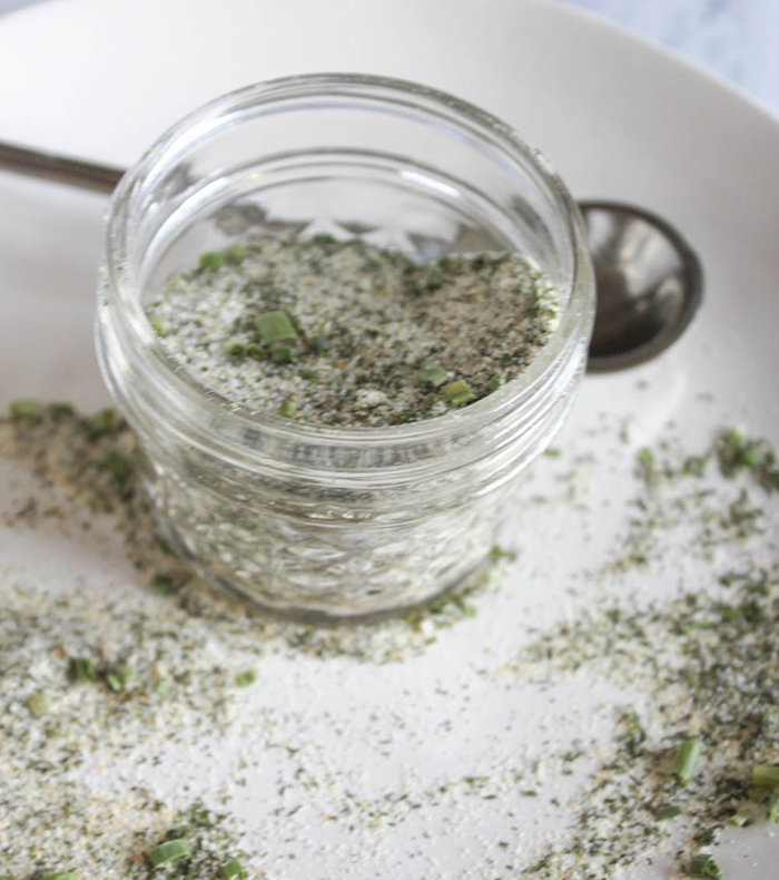 A close up of the spice blend in a jar