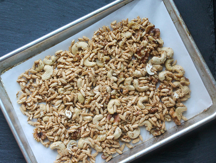 an overhead view of the snack ingredients on a baking sheet