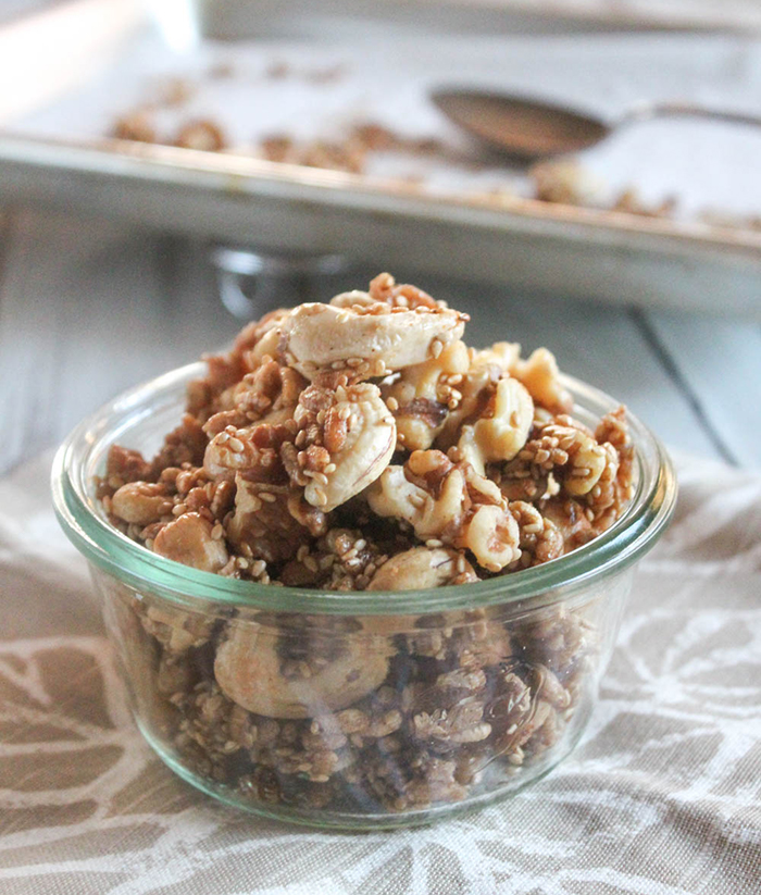 Puffed Rice Cereal snacks in a bowl with a baking sheet in the background