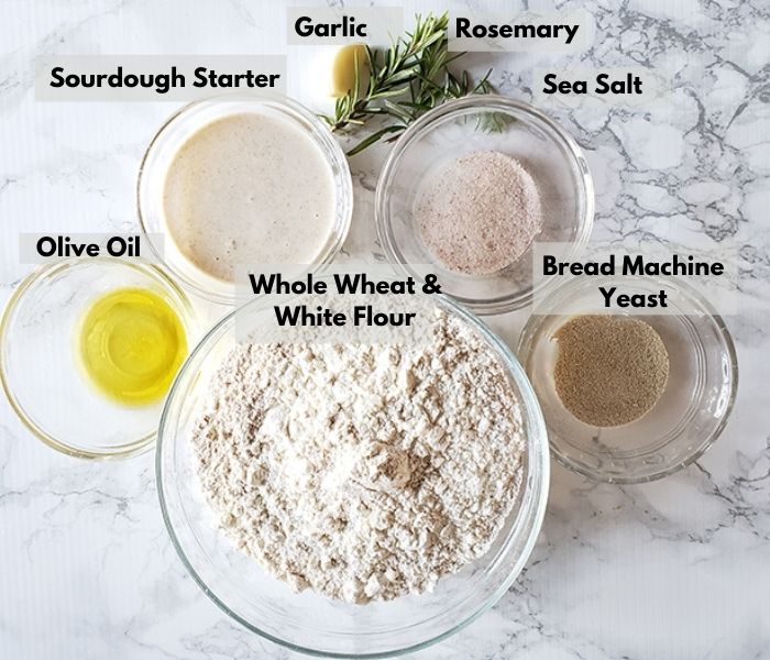 The ingredients: olive oil, sourdough starter, garlic, rosemary, sea salt, bread machine yeast, flour