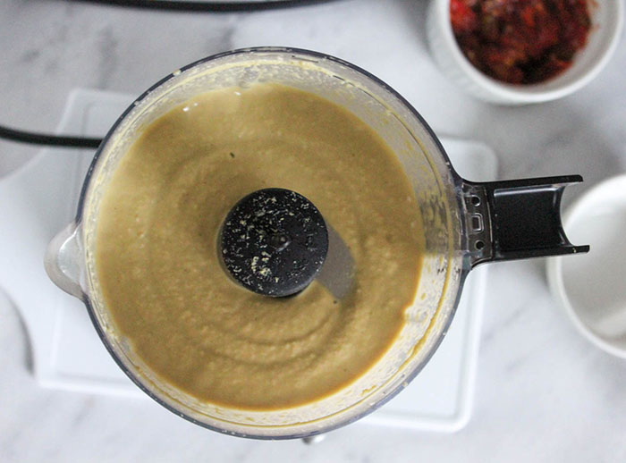 All of the ingredients blended into a cream in a food processor