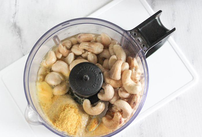 the ingredients in a food processor bowl