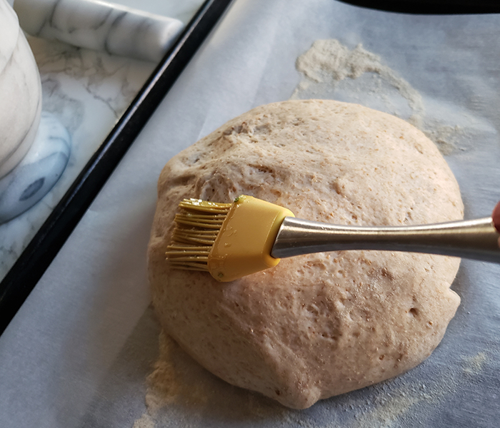 a photo of the bread with a pastry brush