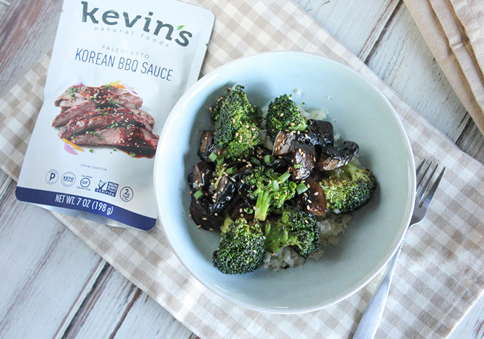 an overhead shot of mushrooms and broccoli in a bowl 