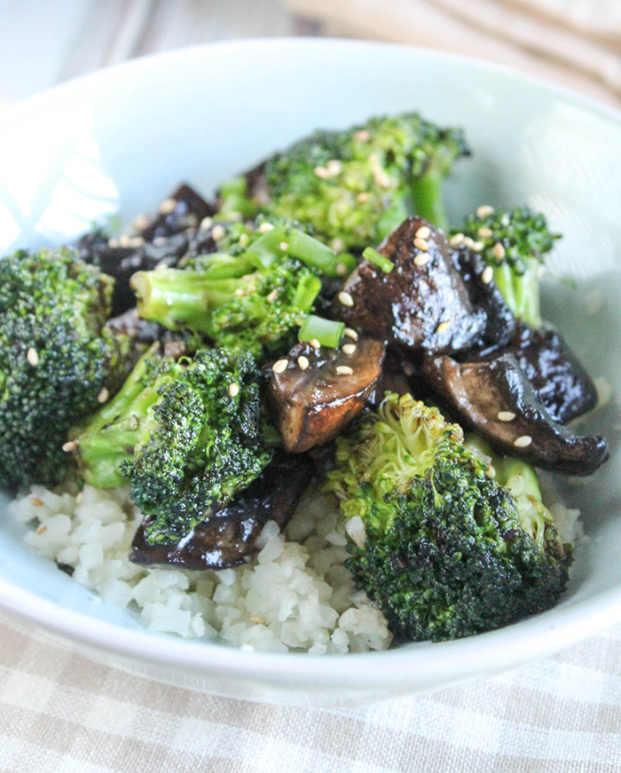 broccoli and portobello mushrooms in a bowl with rice