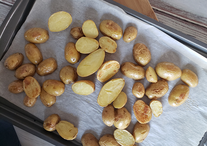 an overhead shot of the baby potatoes that have been roasted.