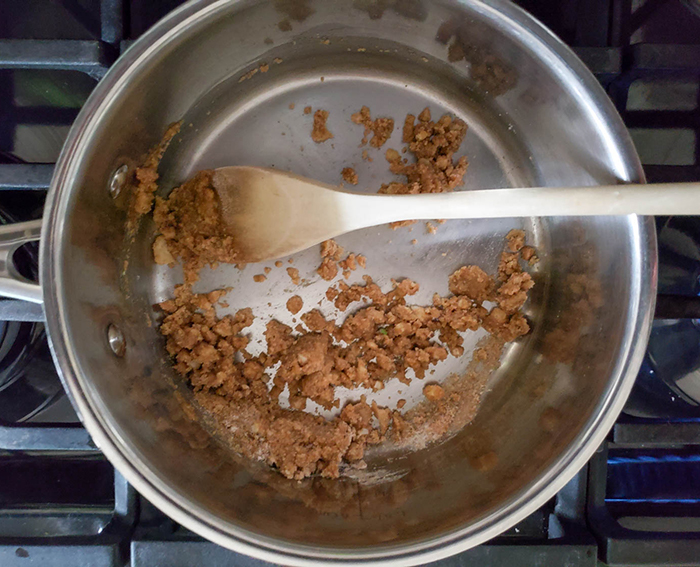 flour and garlic onions cooking in a skillet