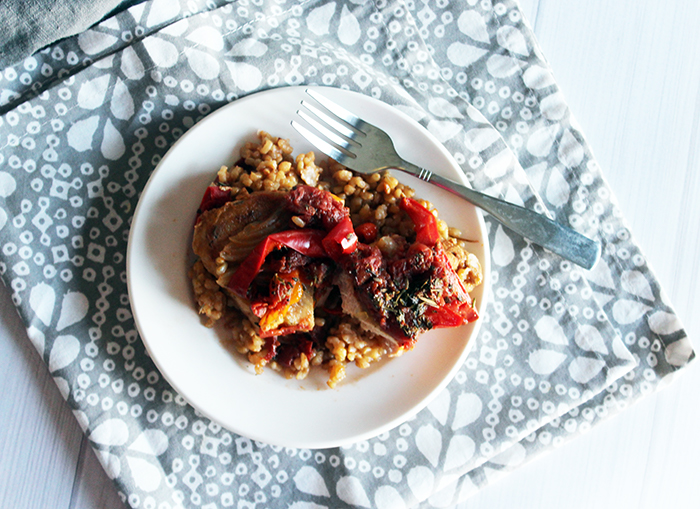 an overhead view of pork chop on a plate with rice