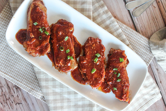 an overhead view of honey garlic pork chops on a platter