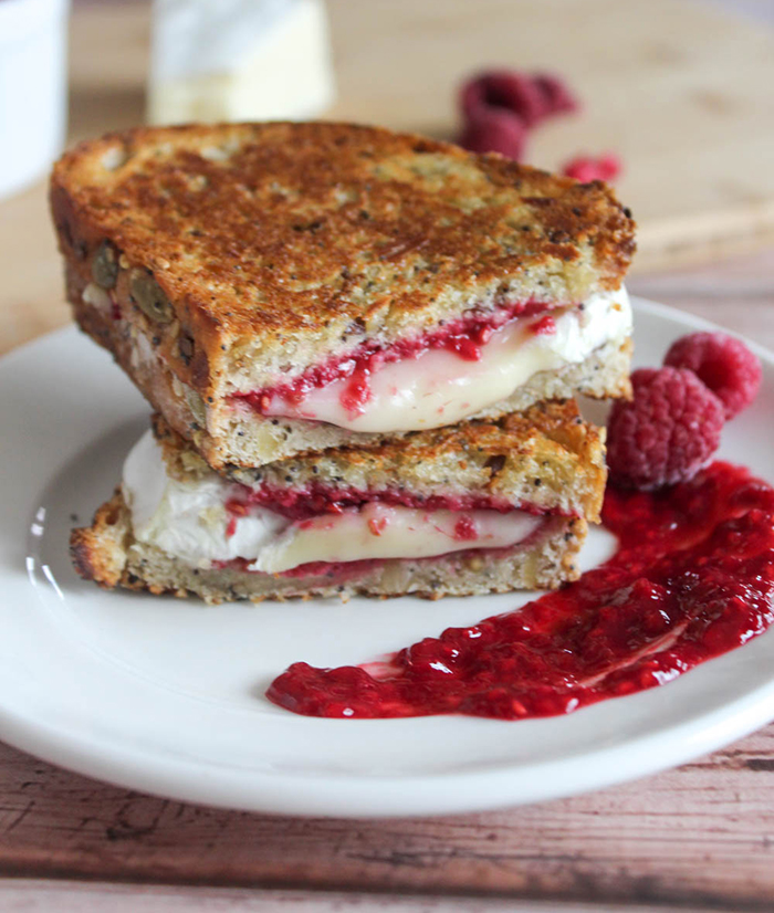 grilled brie cheese on a white plate