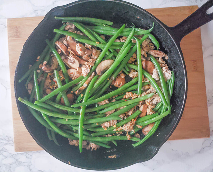 An overhead view of the gren bean stir fry compted