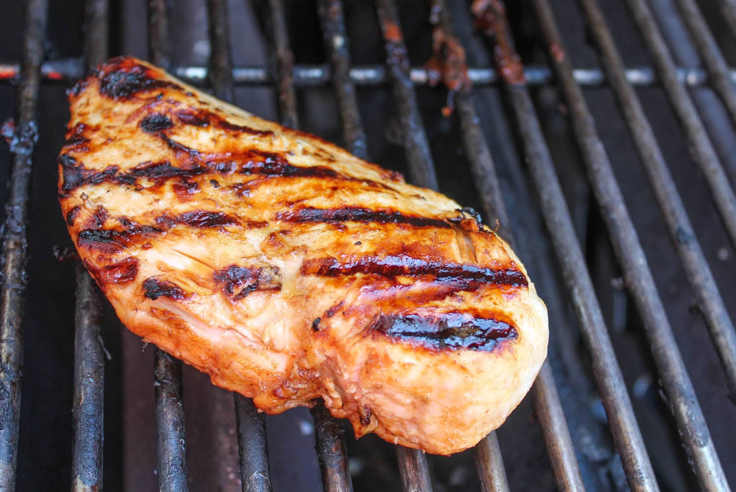 grilled chicken breast on a grill
