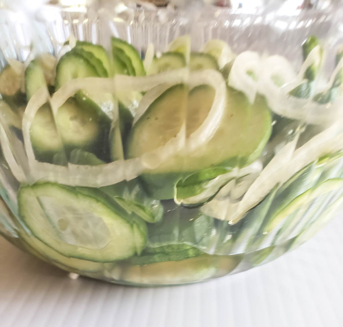 close up picture of cucumber slices in water