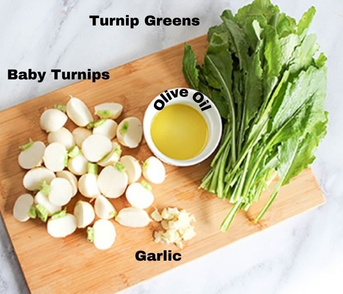 The ingredients: chopped garlic, baby turnips, olive oil and turnip greens 