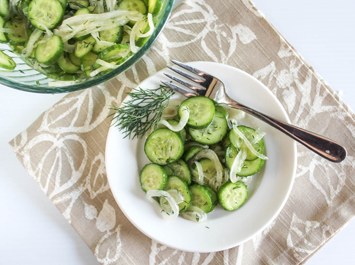 An overhead view of the cucumbers and onions on a plate