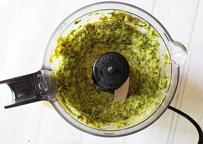 food processor with blended asparagus pesto