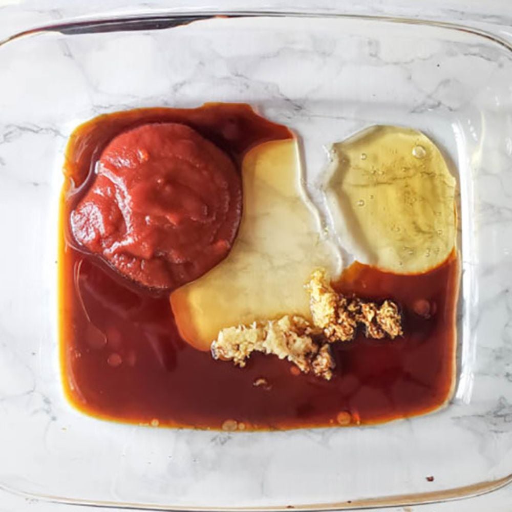 THe marinade ingredients in a glass bowl
