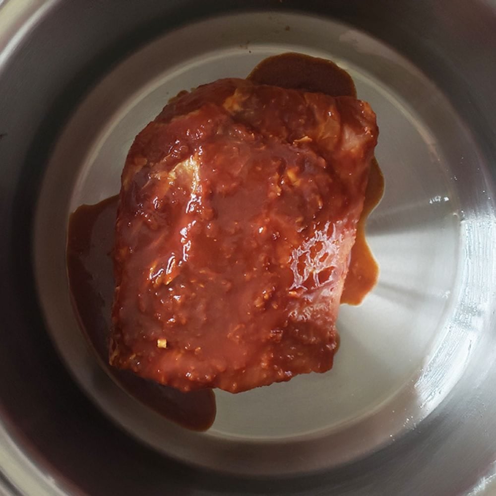 asian pork step 3 pork covered in marinade in slow cooker