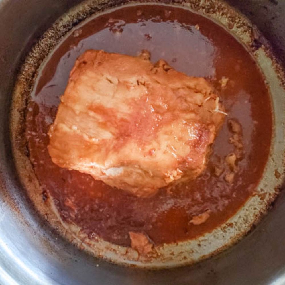 process step 4 cooked pork tenderloin in slow cooker