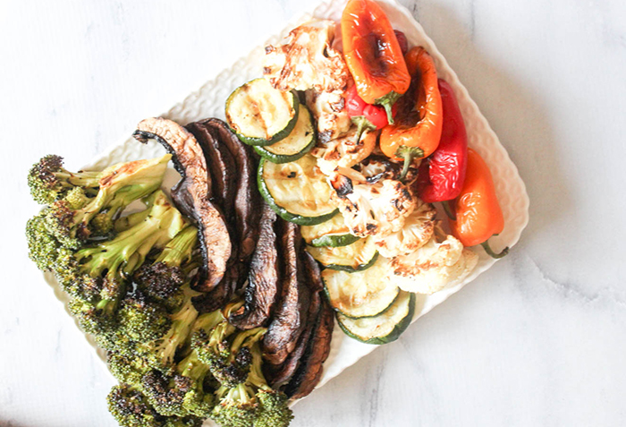 an overhead view of grilled vegetables on a platter