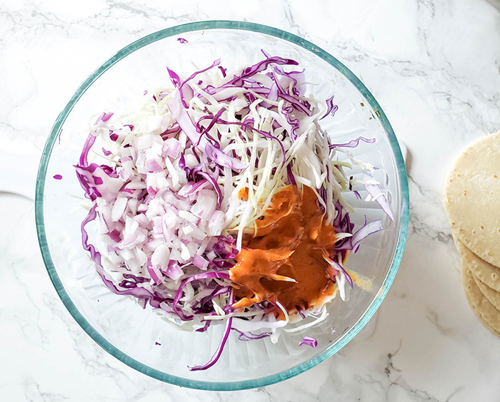 kimchi slaw ingredients in a bowl