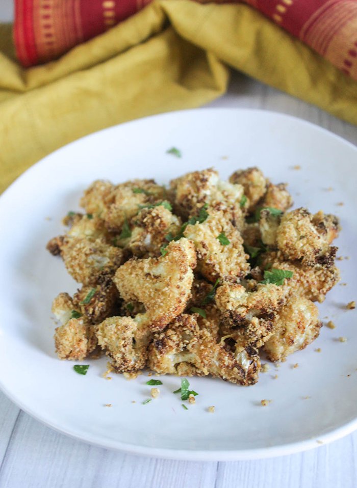 a pile of air fried cauliflower on a plate