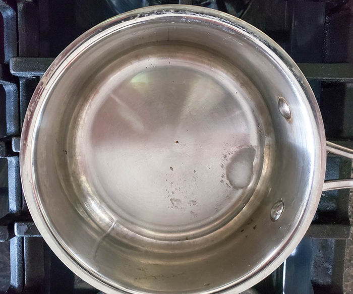 coconut oil melting in a saucepan