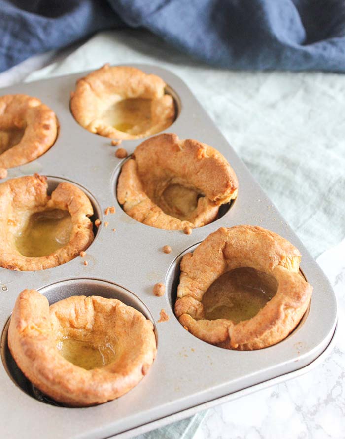 a muffin tray of baked yorkshire puddings