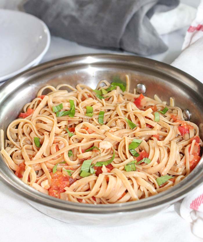 a big bowl of pasta with blush sauce