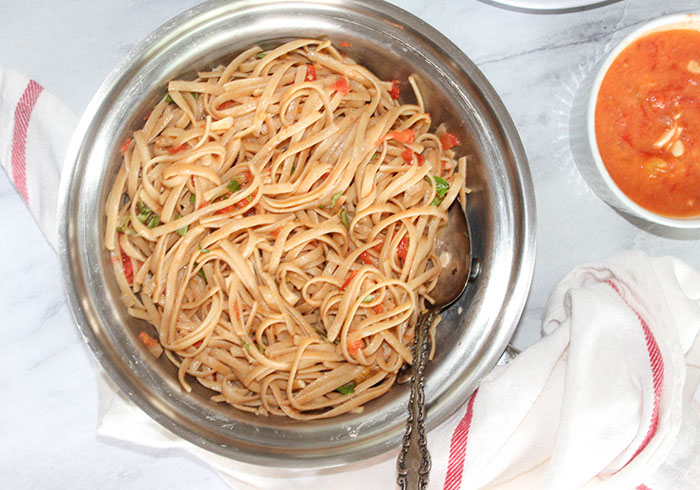 bowl of pasta with blush sauce on it.