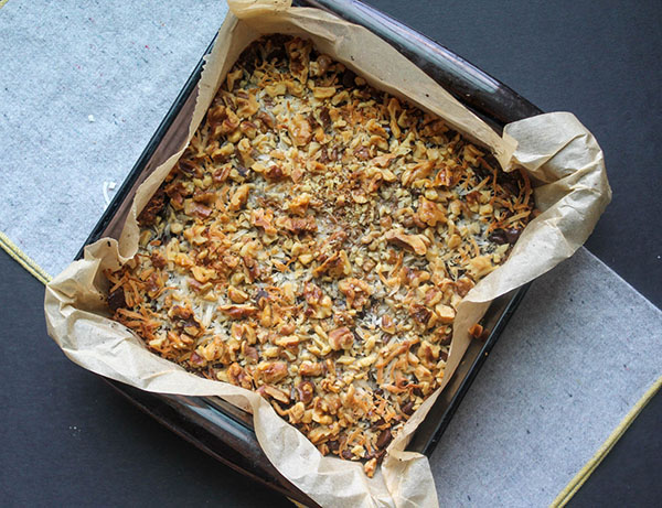 baked magic cookie bars in a pan