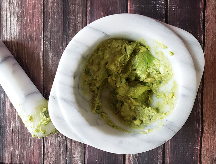 guacamole in mortar bowl