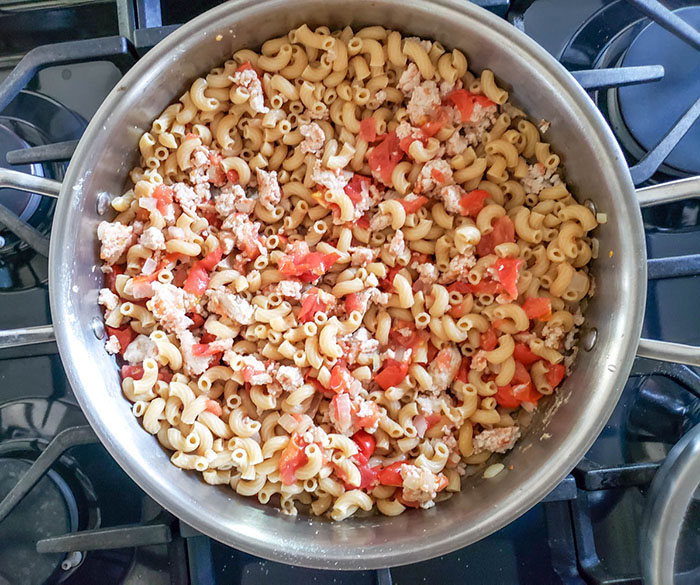 pasta chicken and tomatoes in skillet