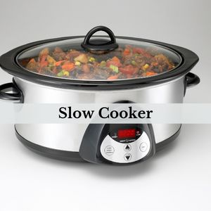 slow cooker with vegetables in it