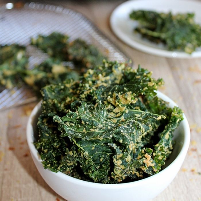 kale chips in a white bowl