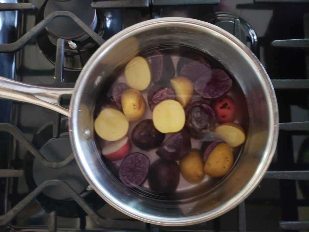 potatoes in a pan of water