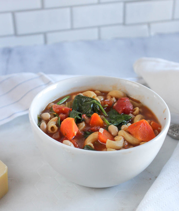 A white bowl filled with White bean soup