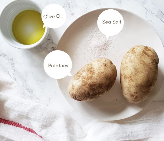 Air fryer baked potato ingredients on a plate