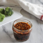 Close up picture of stir fry sauce in a jar