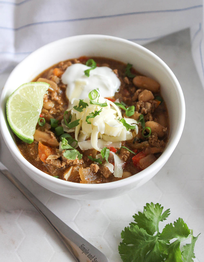 turkey chili soup in a bowl witha spoon