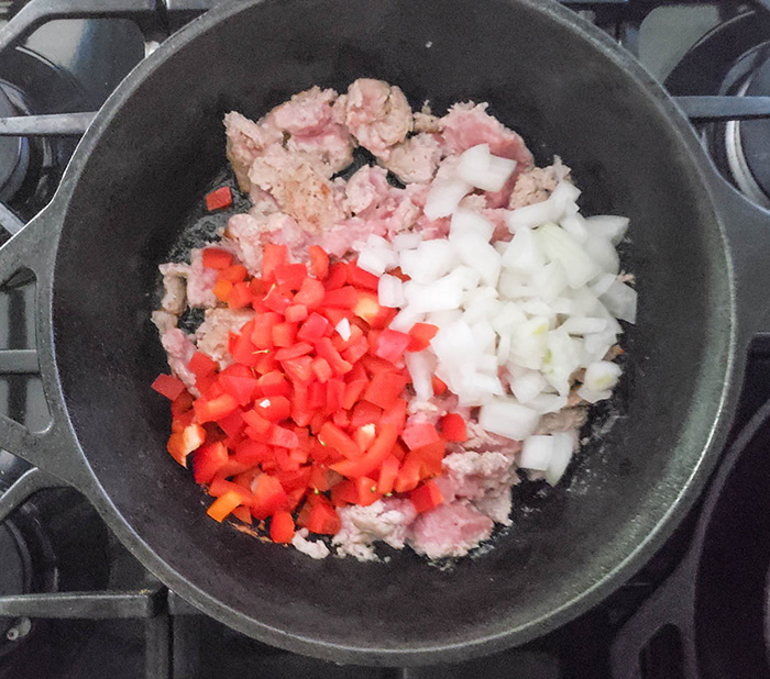 turkey and vegetables cooking in a pan