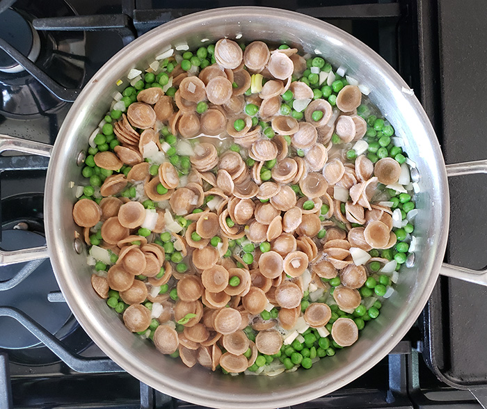 Process pasta peas added to skillet