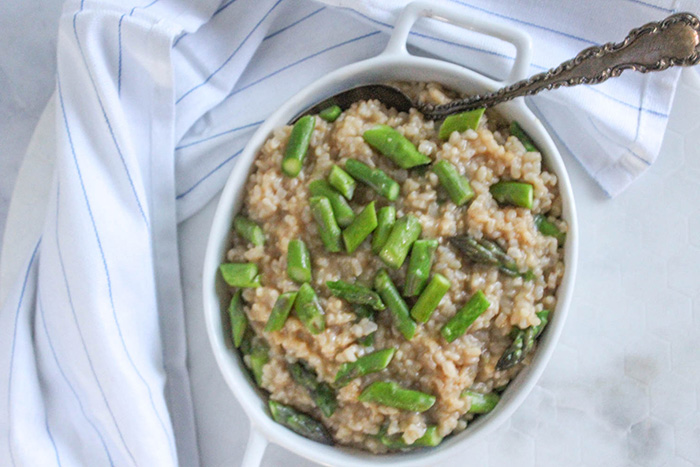 an over head view of risotto with asparagus