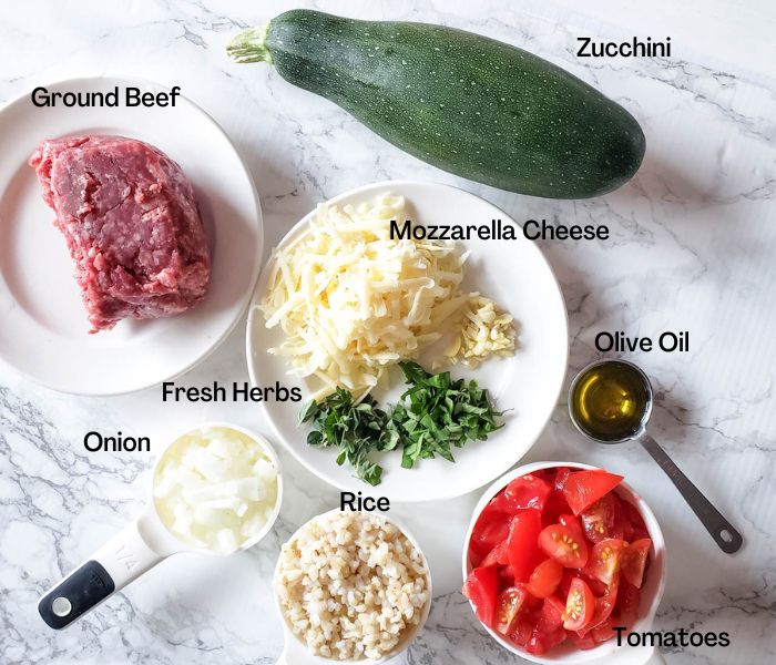 stuffed zucchini ingredients on a board