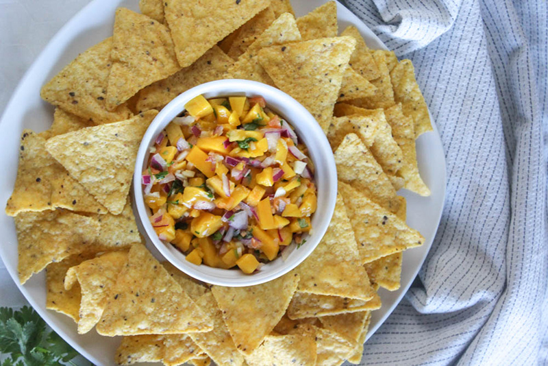 overhead view of mango habanero salsa on a plate