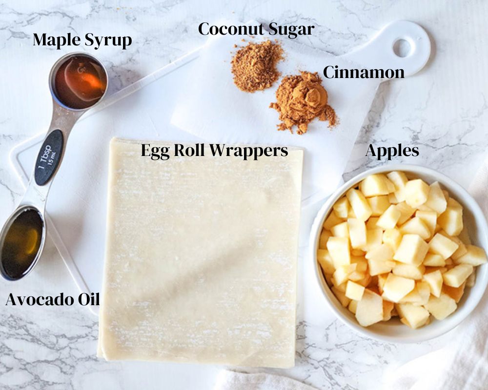 An overhead picture of apple pie egg roll ingredients