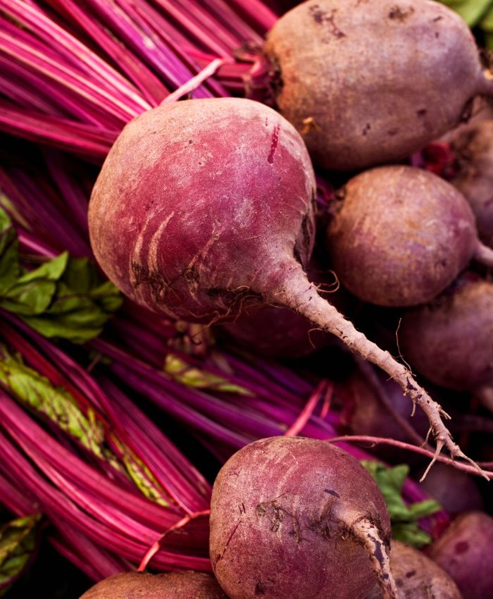 a close up picture of raw beets