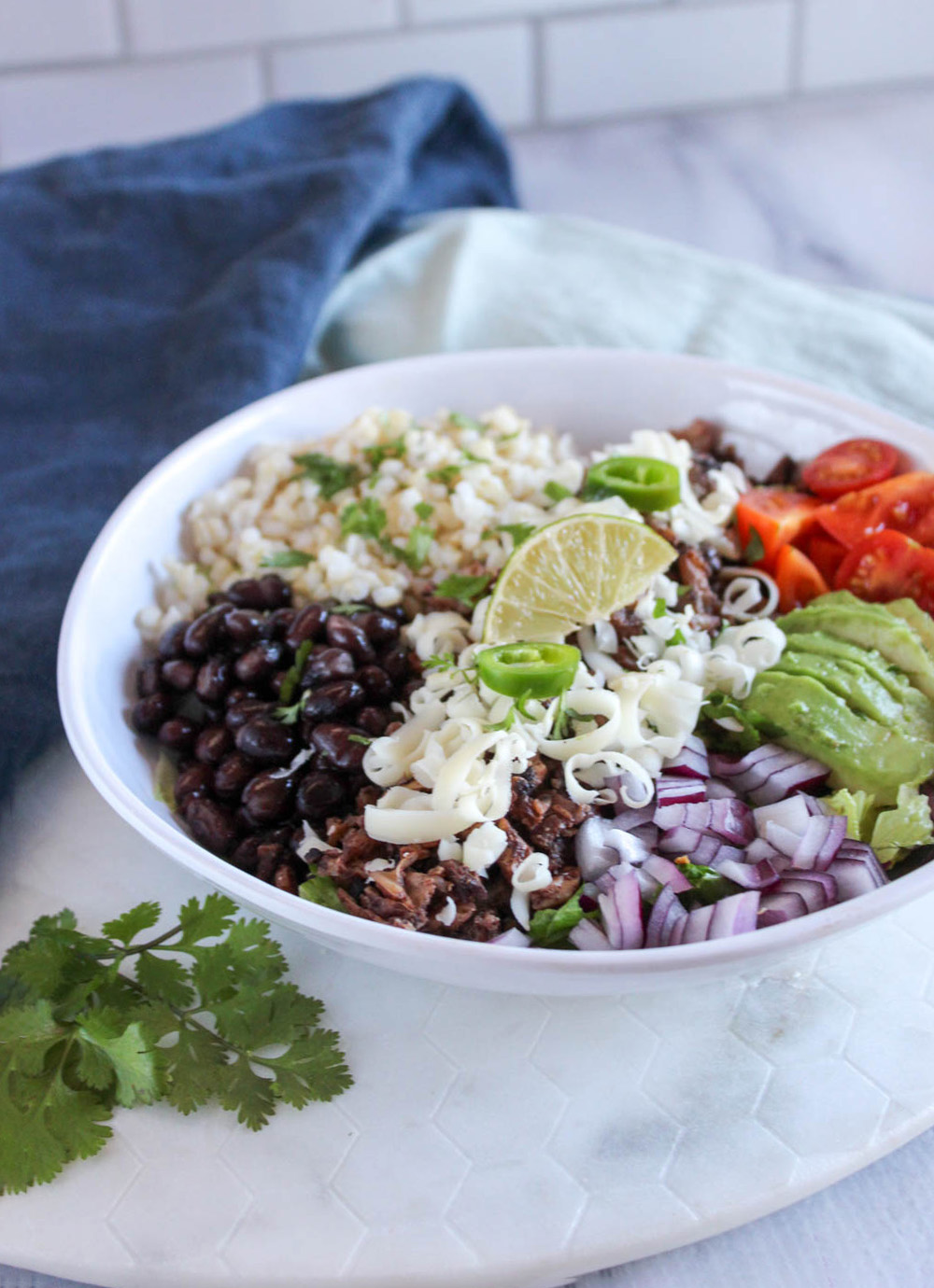 a picture of vegetarian burrito bowl in a white bowl 