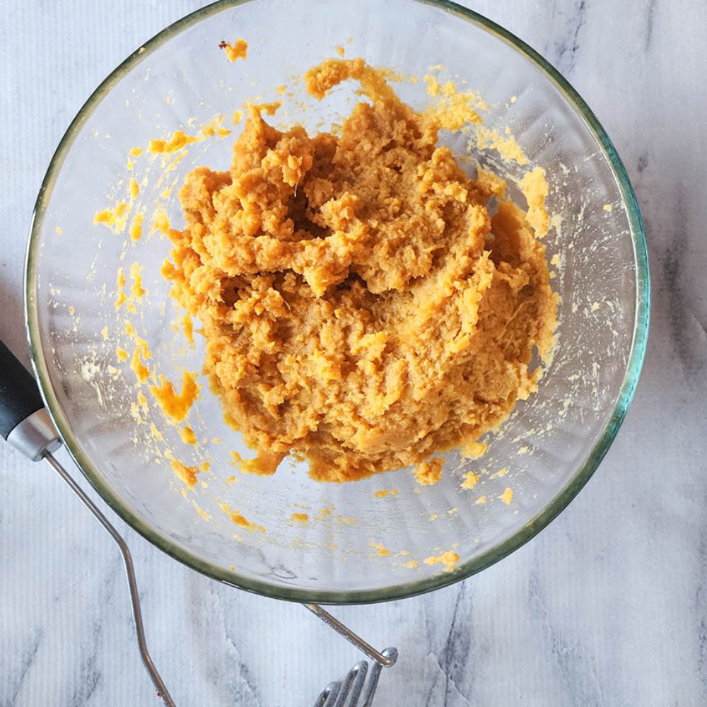Sweet potato casserole step 3 mashed sweet potatoes in a mixing bowl