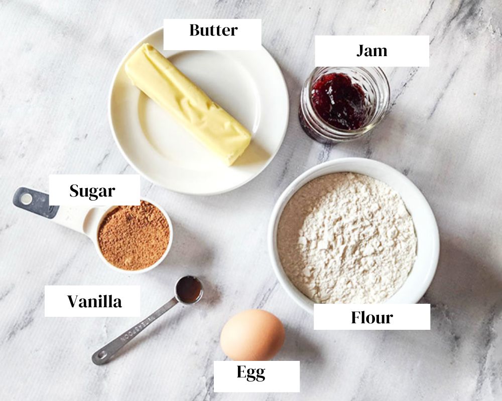 a picture of the ingredients needed to make butter cookies with butter, jam, sugar, vanilla, egg, flower